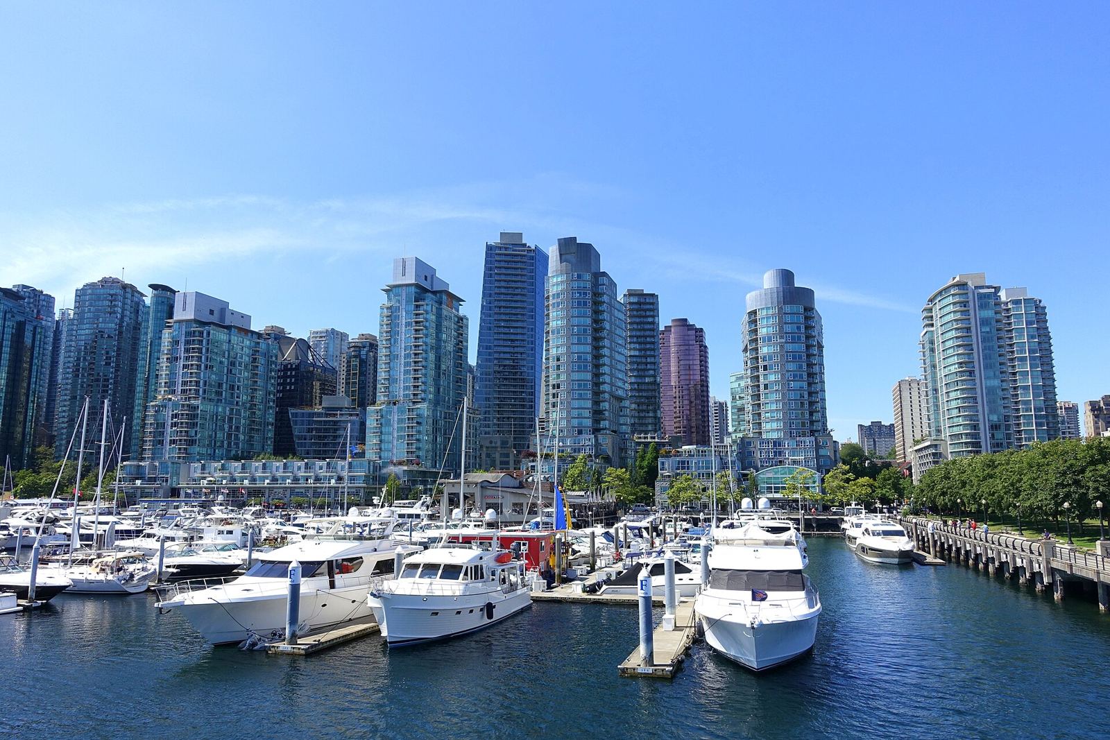 Downtown Vancouver skyline over a marina